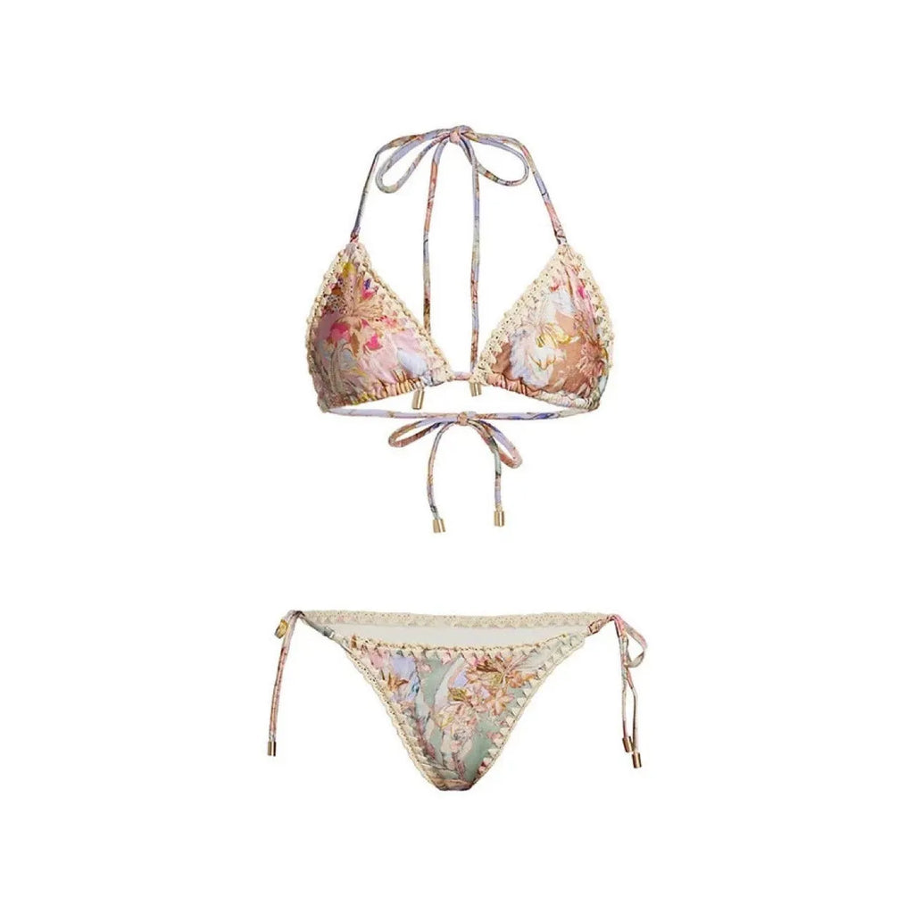 Women's creamy-white floral bikini swimsuit with separate top, underwear, and skirt pieces