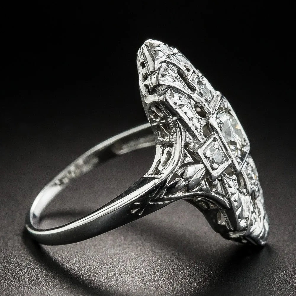 Silver electroplated copper ring with hollow-out geometry design and diamond studs