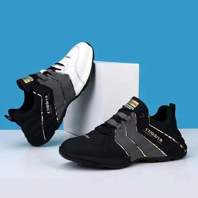 Casual low-top sneakers with a thick plastic sole and mesh lining in grey and black colourway.