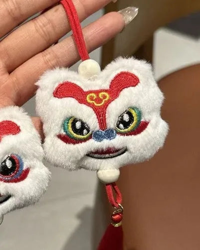 Chinese style blue plush lion keychain ornament with star stone decoration and yellow tassel