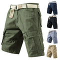 Cotton and polyester loose fit cargo shorts in army green with pockets, shown on size chart.