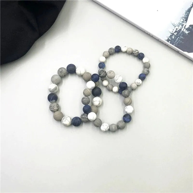 Handmade men's planet stone bracelet with starry sky beads in a U-shaped design.