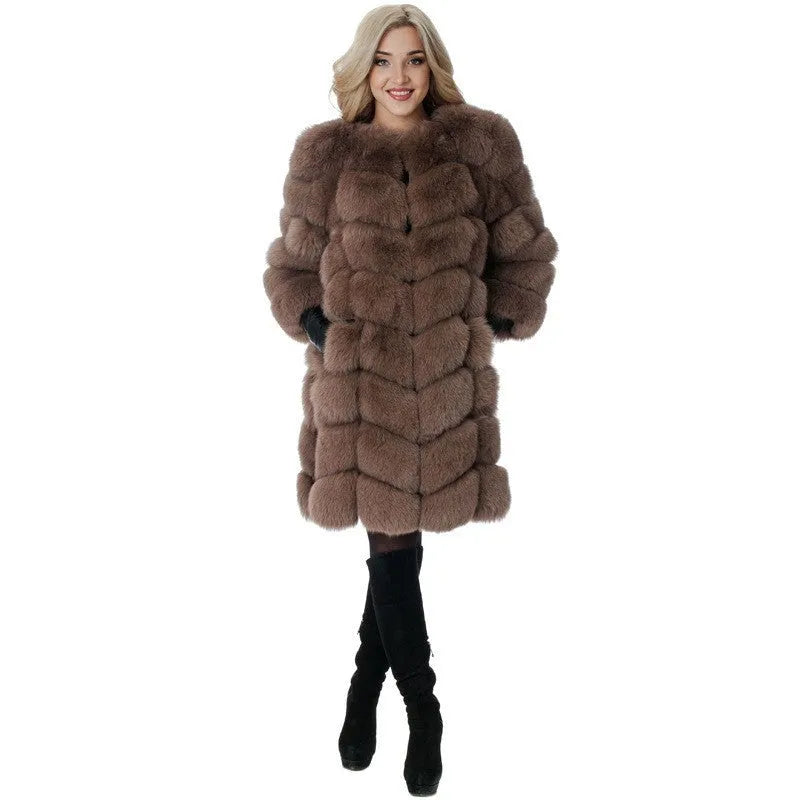 Women's long black artificial fur coat with regular sleeves.