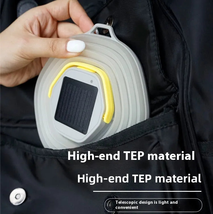 White portable camping lamp with a large light capacity and a single control button.