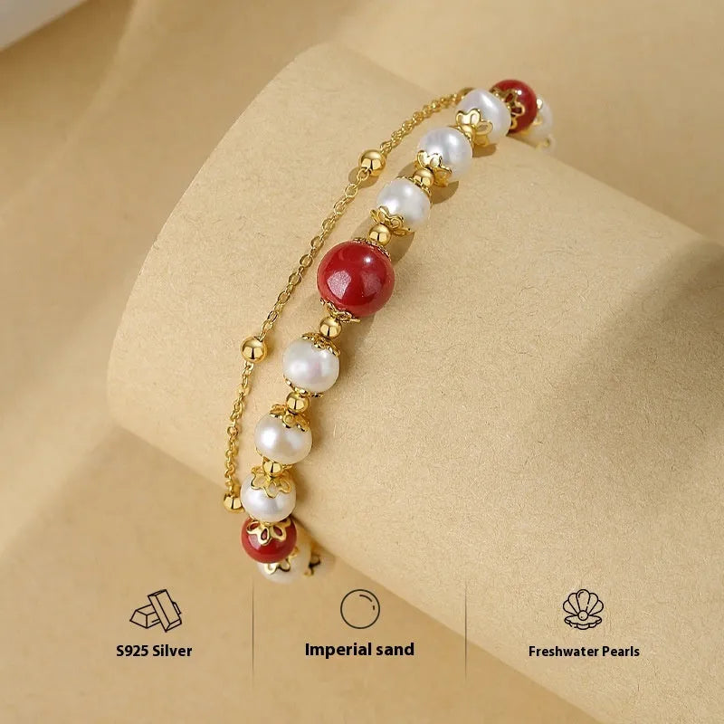 Sterling silver double-layer bracelet with white freshwater pearls and red cinnabar bean beads