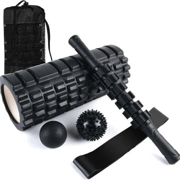 Black 33cm long foam roller massage stick with gear bar design on a grey background.
