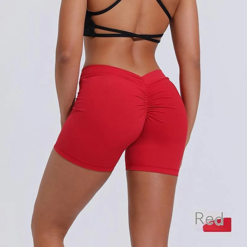 Women's nylon tight training shorts in black, side view, showing fitted cut and elastic waistband.