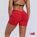 Women's nylon tight training shorts in black, side view, showing fitted cut and elastic waistband.