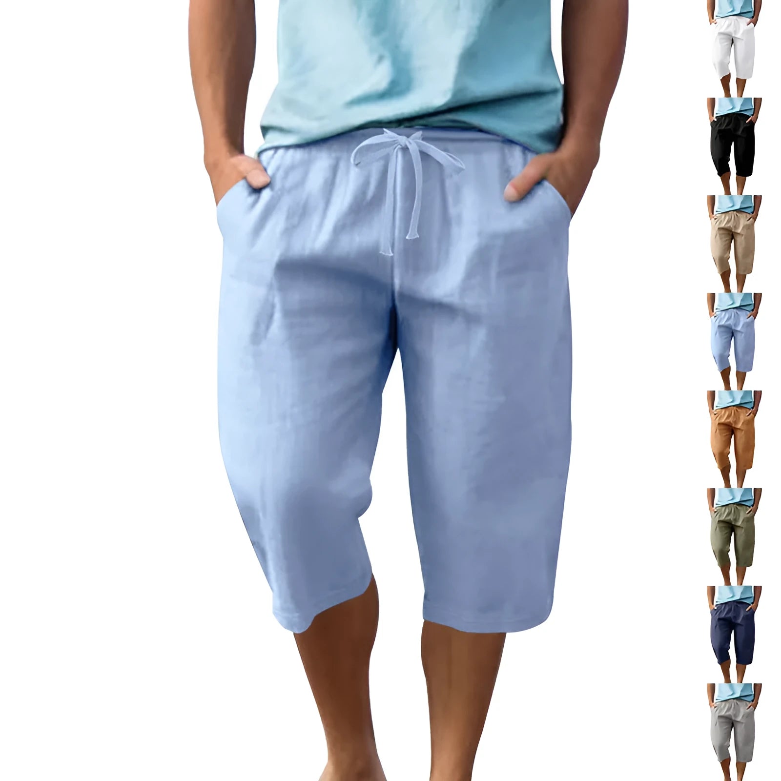 Man wearing light blue linen casual shorts with a cropped length and high waist.