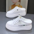 White women's platform sandals with mesh upper and round toe design