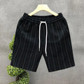Black and white striped men's casual fleece-lined shorts with an elastic waistband.