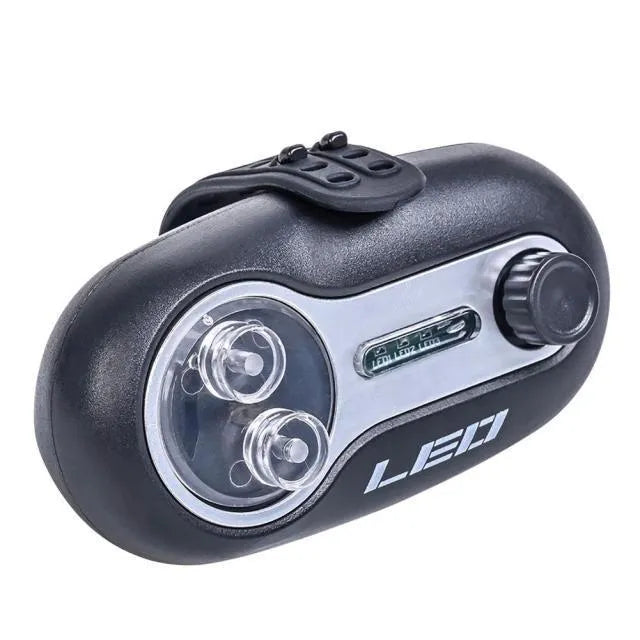 Fishing rod alarm with automatic signal lamp in blue or black colours for night fishing