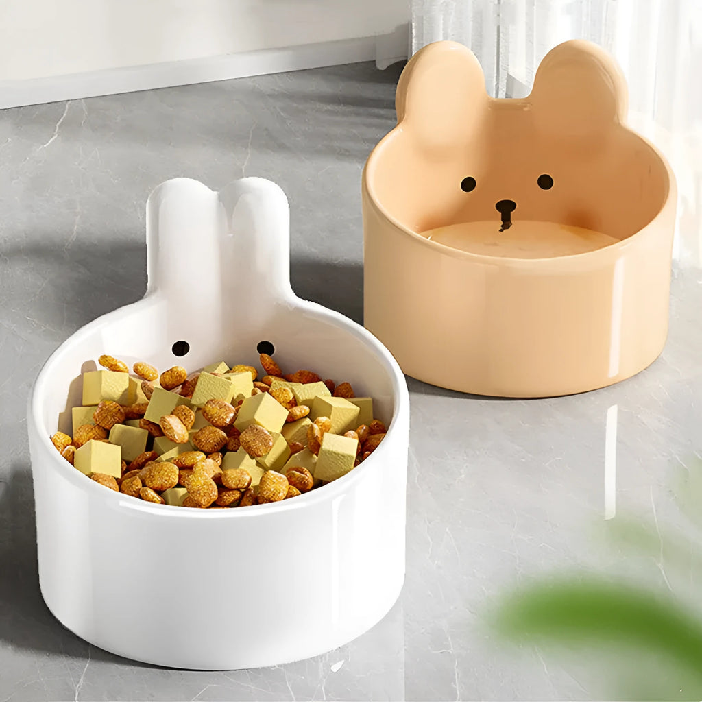 Ceramic pet bowls with neck protection design in white rabbit and brown bear patterns for dogs and cats