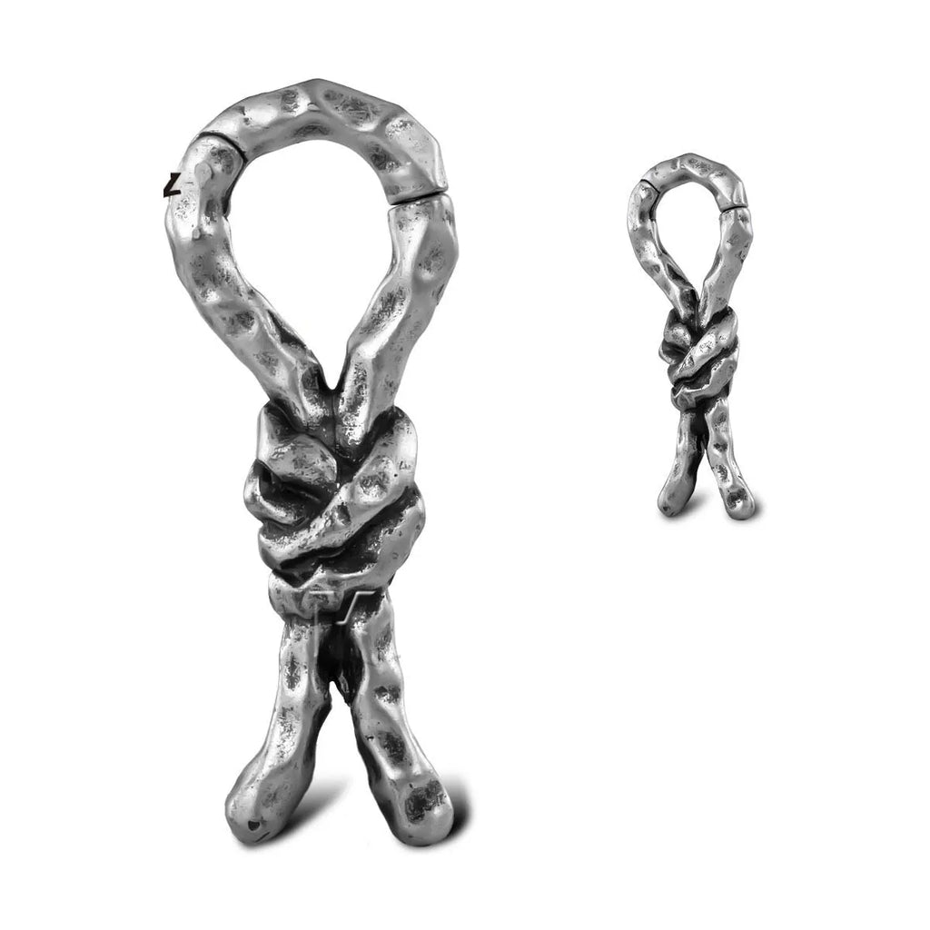 Close-up of a single 4mm copper piercing earring with a retro bending and connecting shape.