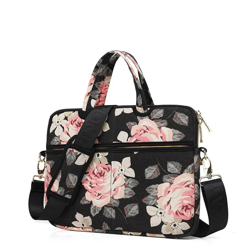 Canvas laptop sleeve with printed pattern for 13-15 inch notebooks, plush lining, and padded shoulder strap