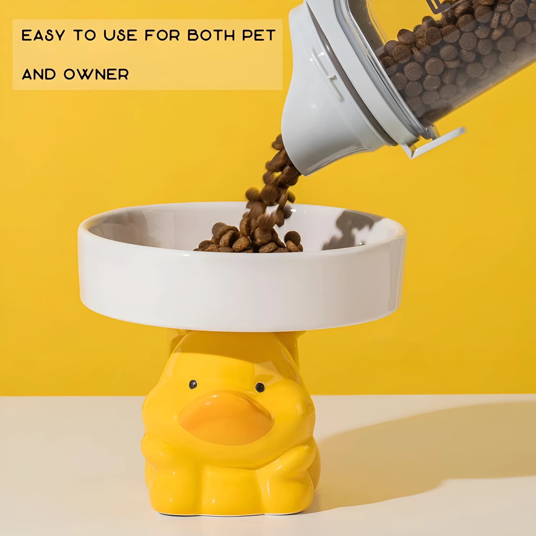 Raised ceramic cat bowl in animal theme design showing height and wide feeding surface