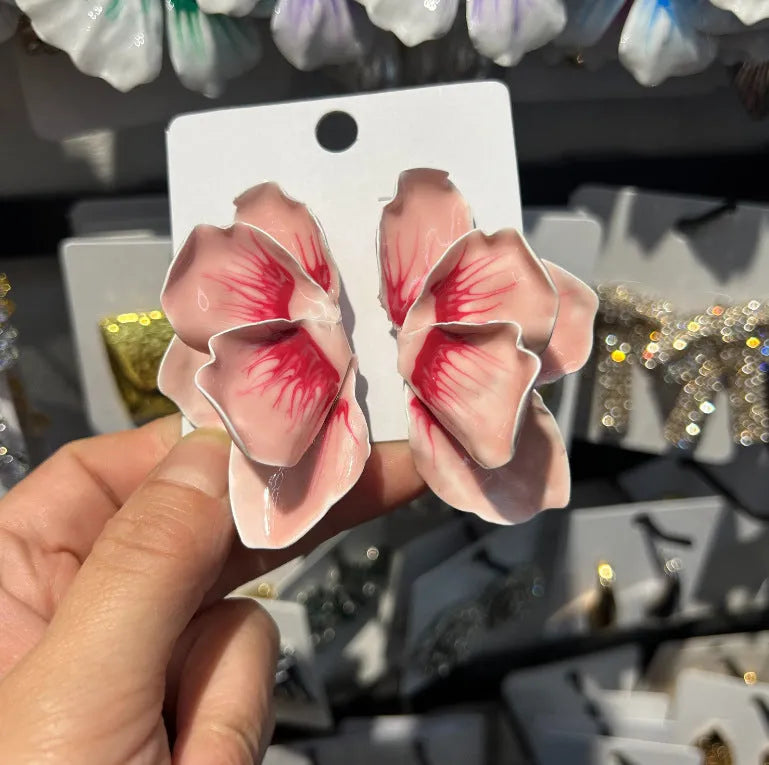 Alloy flower stud earrings with oil-spot glaze finish in blue, green, purple, and rose colour variations