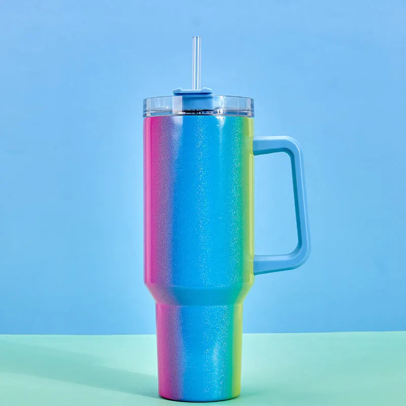 Stainless steel vacuum insulation cup in rainbow gradient colours showing double-layer construction