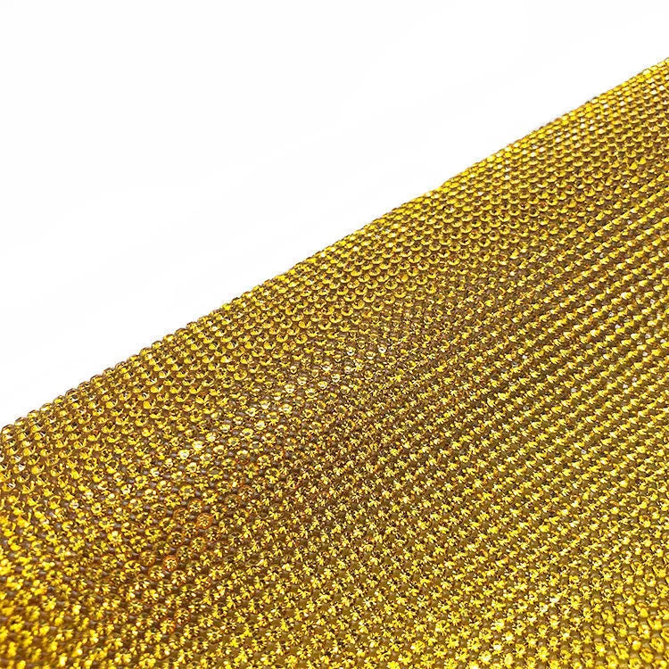 Sheet of rhinestones on net backing with hot drill glue, showing multiple colour options including AB and rose gold.