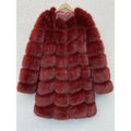 Women's long black artificial fur coat with regular sleeves.
