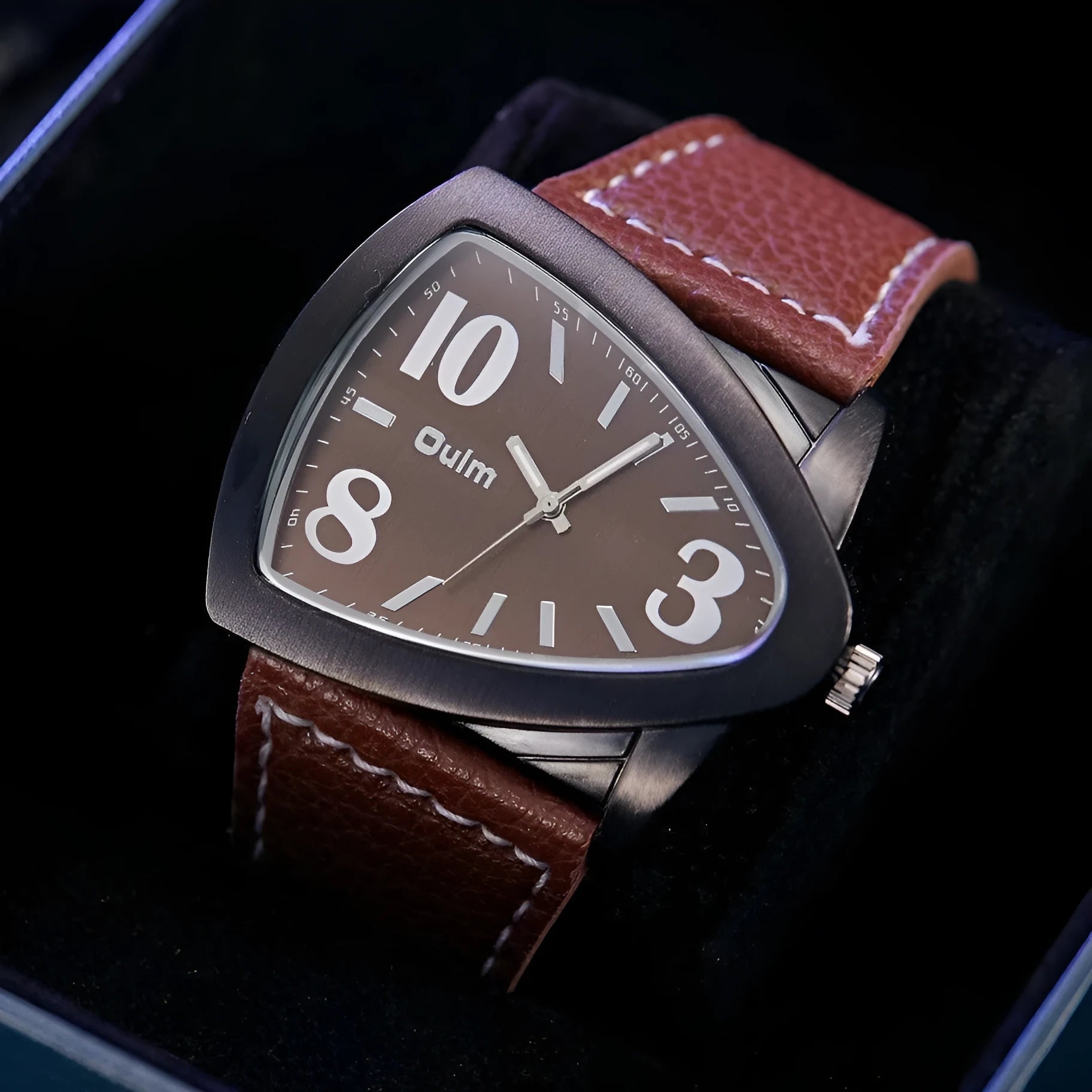 Men's casual wristwatch with a distinctive triangle-shaped strap on a wrist