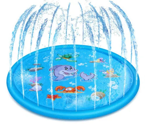 Blue children's water spray mat with marine animals laid on grass, connected to a garden hose.
