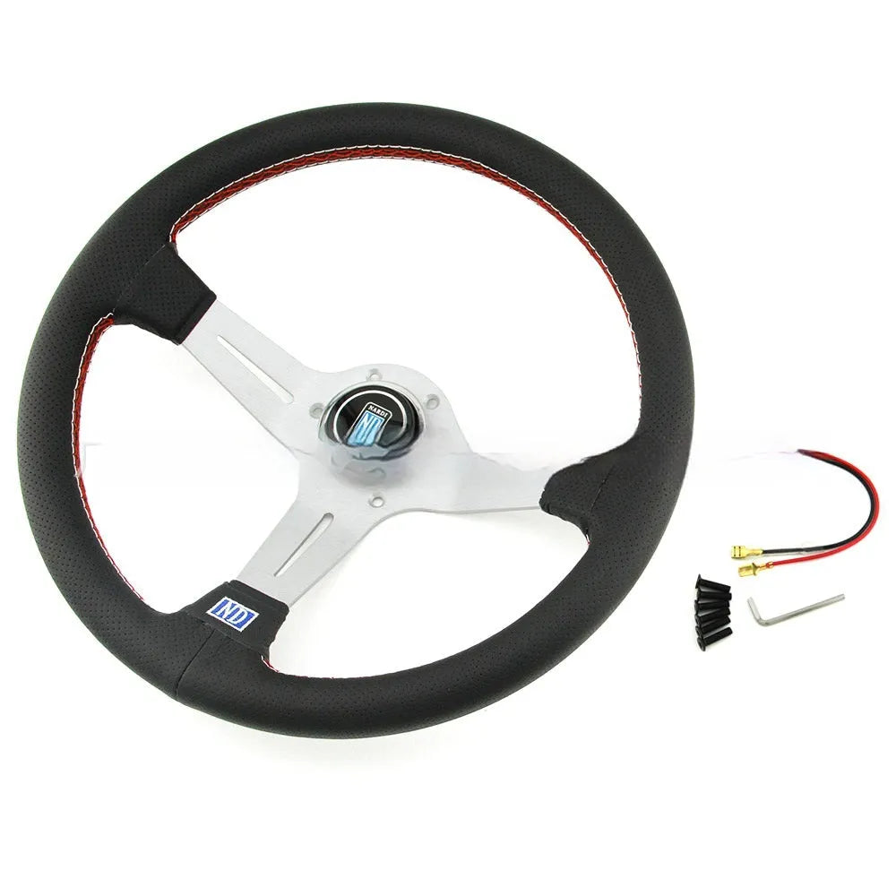 Leather-wrapped 14-inch steering wheel with concave centre and silver metal skeleton frame