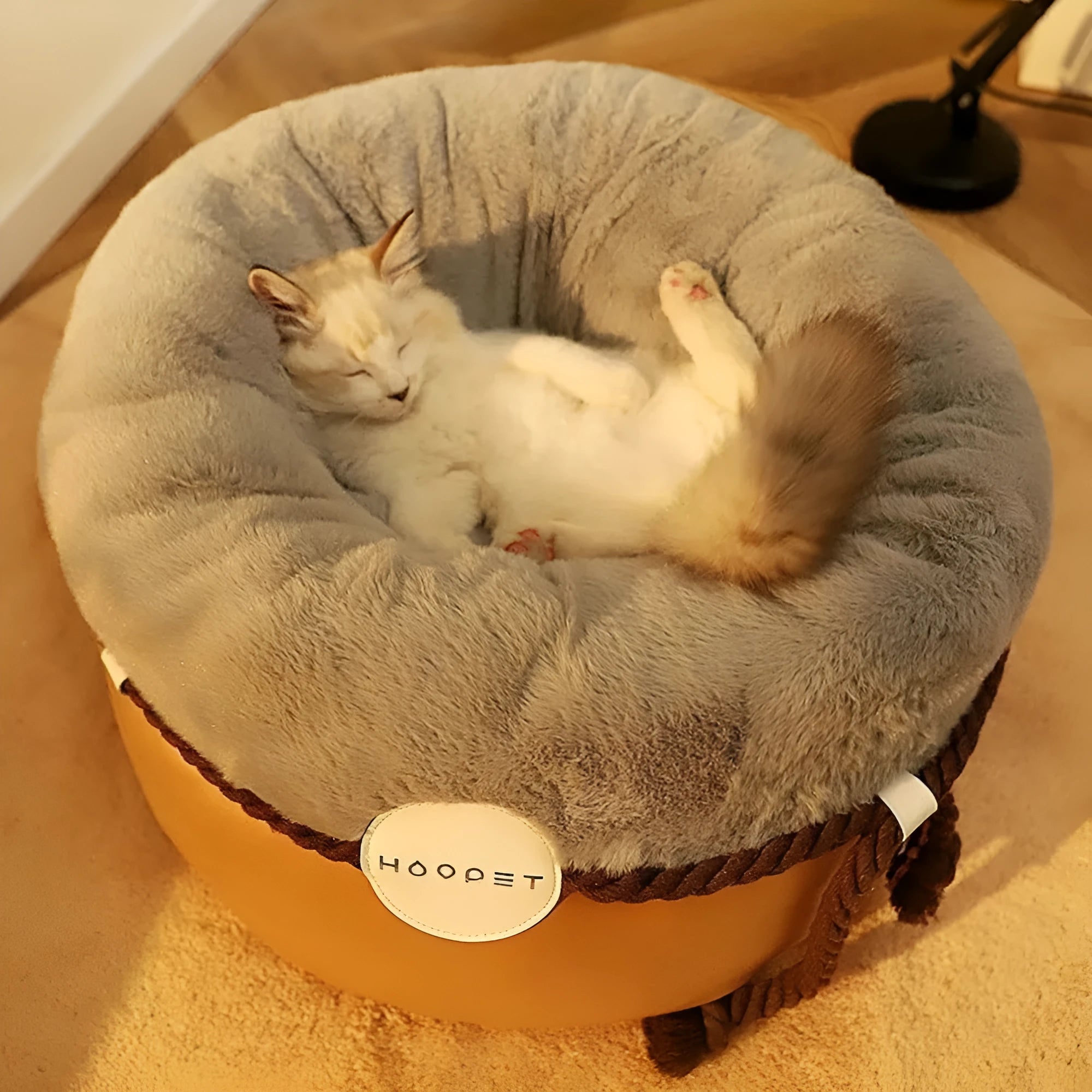 Closed solid colour warm cat nest in warm yellow, made from polyester PU cotton, available in small and medium sizes