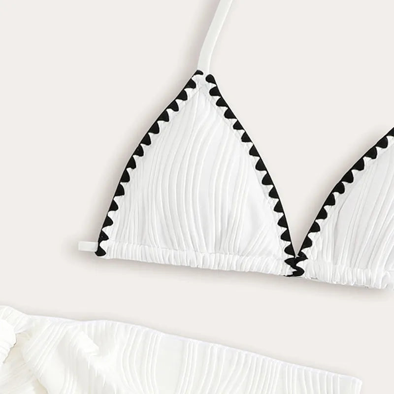 White solid colour three-piece swimsuit set for girls with top, pants, and skirt