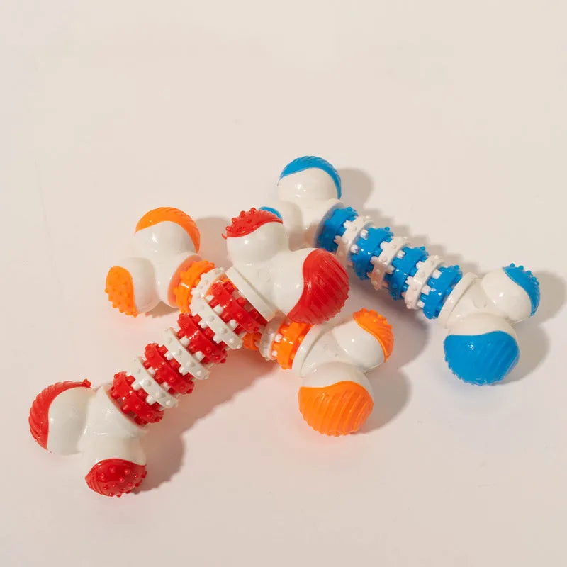 Blue, orange, and red bone-shaped interactive chew and treat toy for small breed dogs.