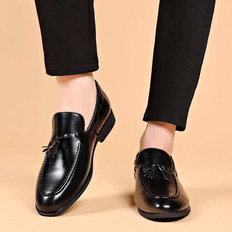Men's low heel pointed toe leather shoes in black with patent finish and rubber sole