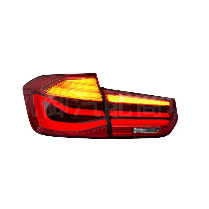BMW 3 Series modified LED tail light assembly in red or black smoke finish, showing streamer running light design.