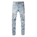 Light blue slim fit men's jeans with patch details, holes, and enzyme-washed finish