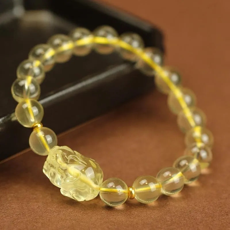 Yellow leather bracelet with artificial crystal beads and Pi Xiu charm in Chinese national style