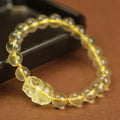 Yellow leather bracelet with artificial crystal beads and Pi Xiu charm in Chinese national style