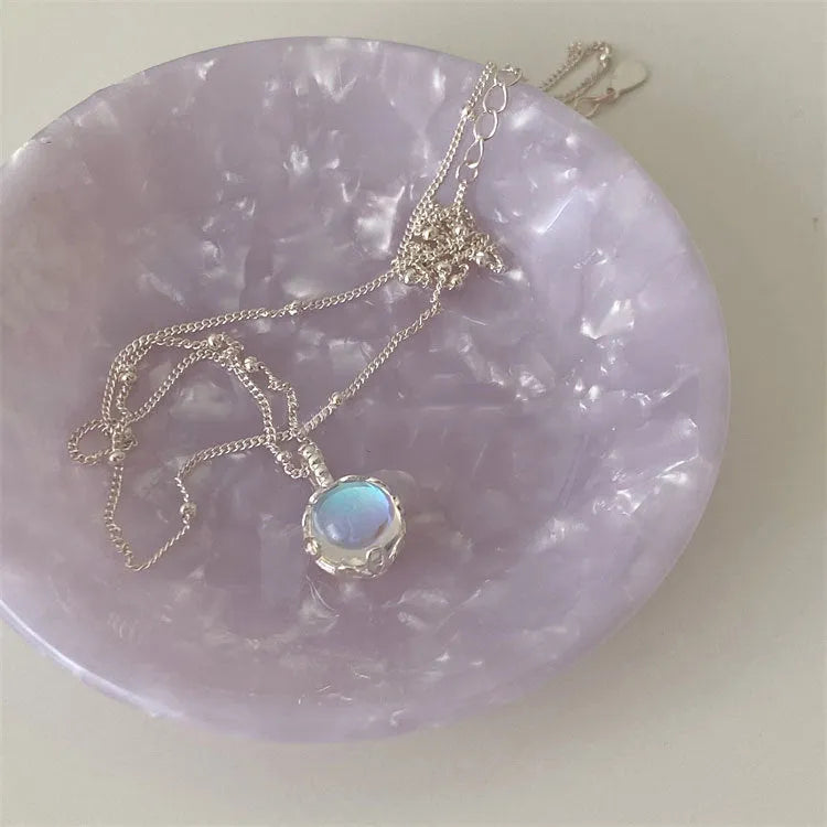 Women's 925 silver curb chain necklace with a round geometric stone pendant.