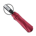 Automatic triple folding business umbrella in palace style with a black canopy and rubber handle.