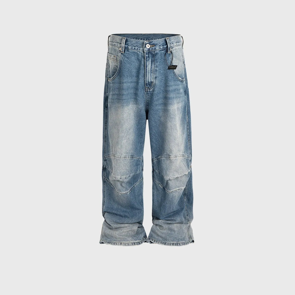 Men's washed white blue baggy jeans with pleated detailing and straight-leg style