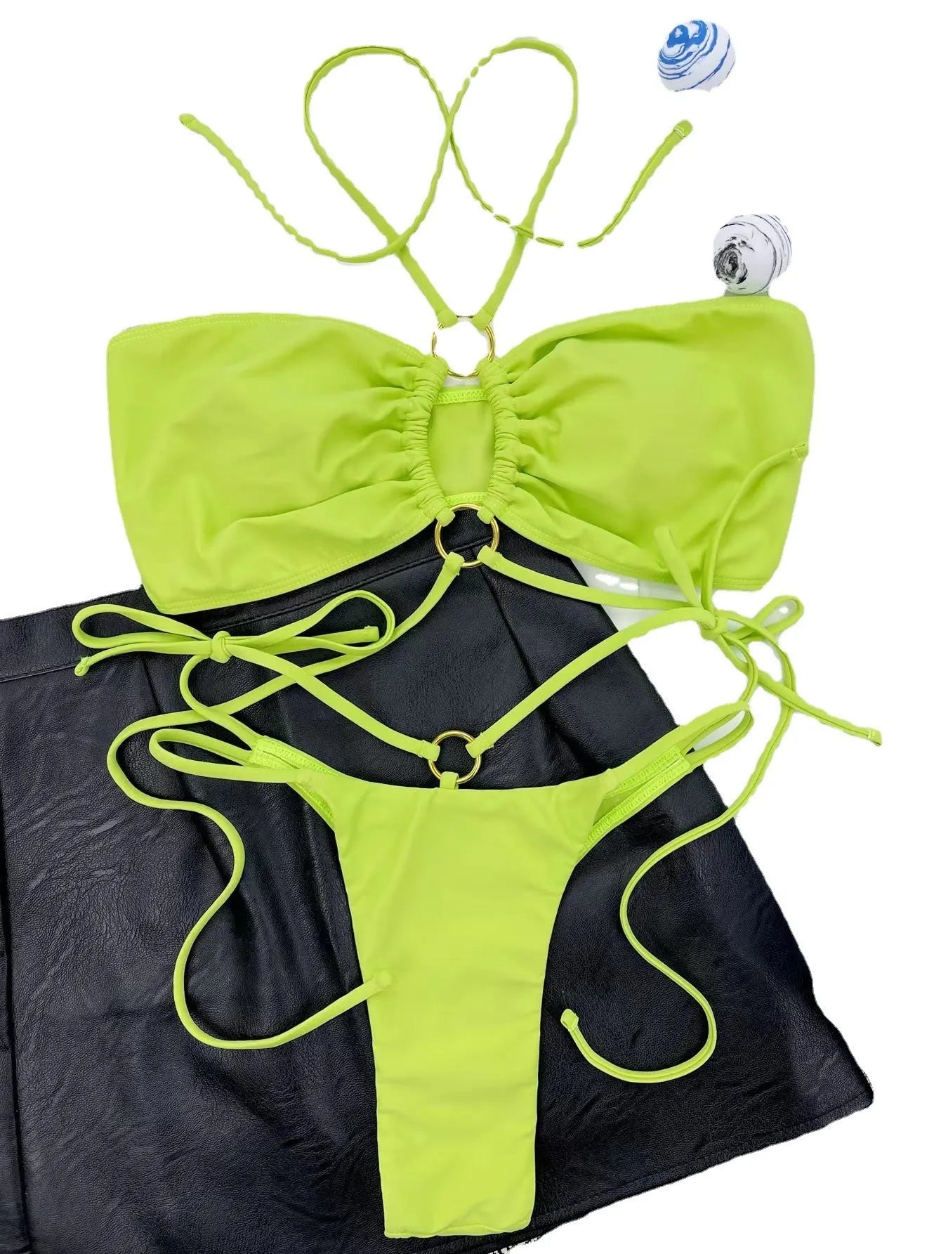 Yellow green women's lace-up triangle bikini swimsuit on white background