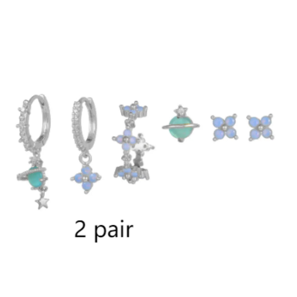 Gold and silver flower-shaped ear studs with zircon mosaic detail, Japanese Korean sweet girl style.