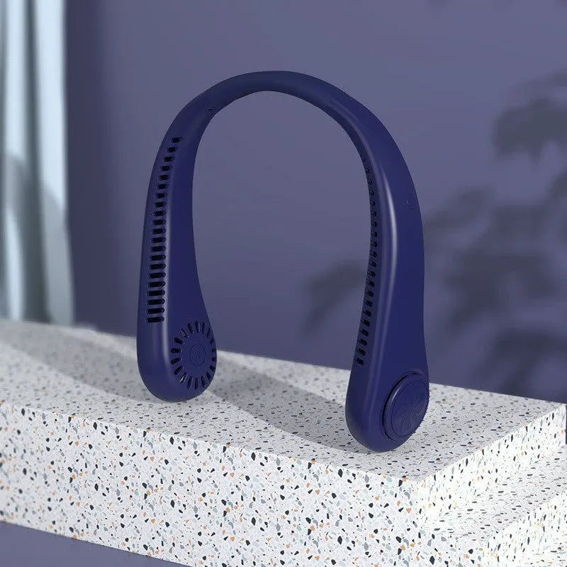 Pink bladeless neck fan being worn, showing adjustable neckband and air outlet.