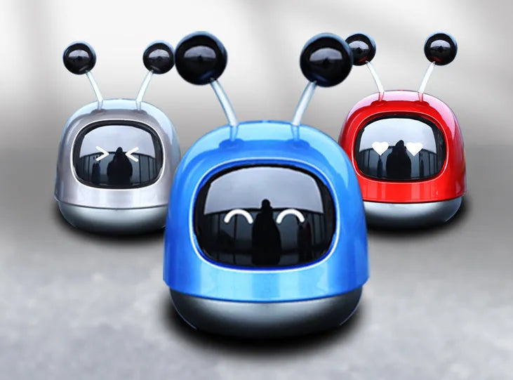 Creative robot car vent aromatherapy decoration with gel diffuser in blue, grey, or red.