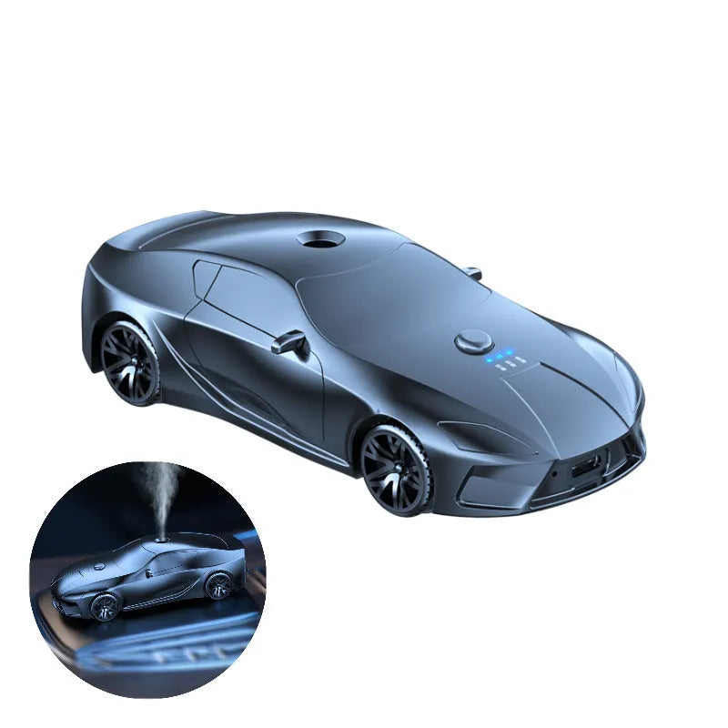 Grey cartoon car model aromatherapy diffuser in aluminium alloy, 12.9 cm x 5.9 cm x 3.7 cm, with three essential oil bottles.