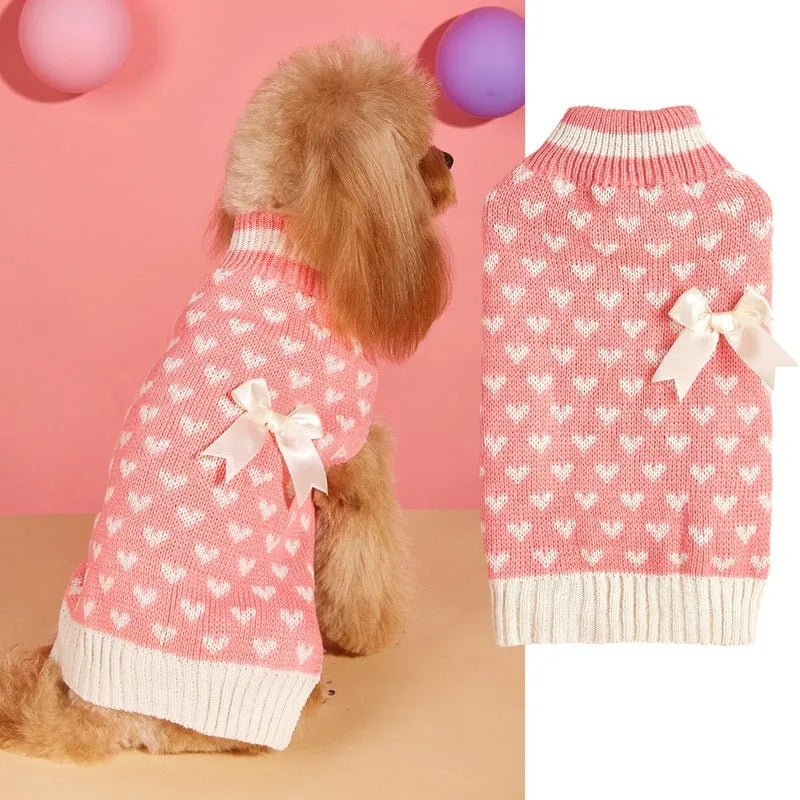 Red love heart design dog sweater on small dog showing acrylic knit and decorative motifs