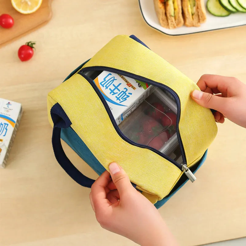 Insulated lunch bag in blue made from waterproof Oxford cloth with aluminium foil lamination.