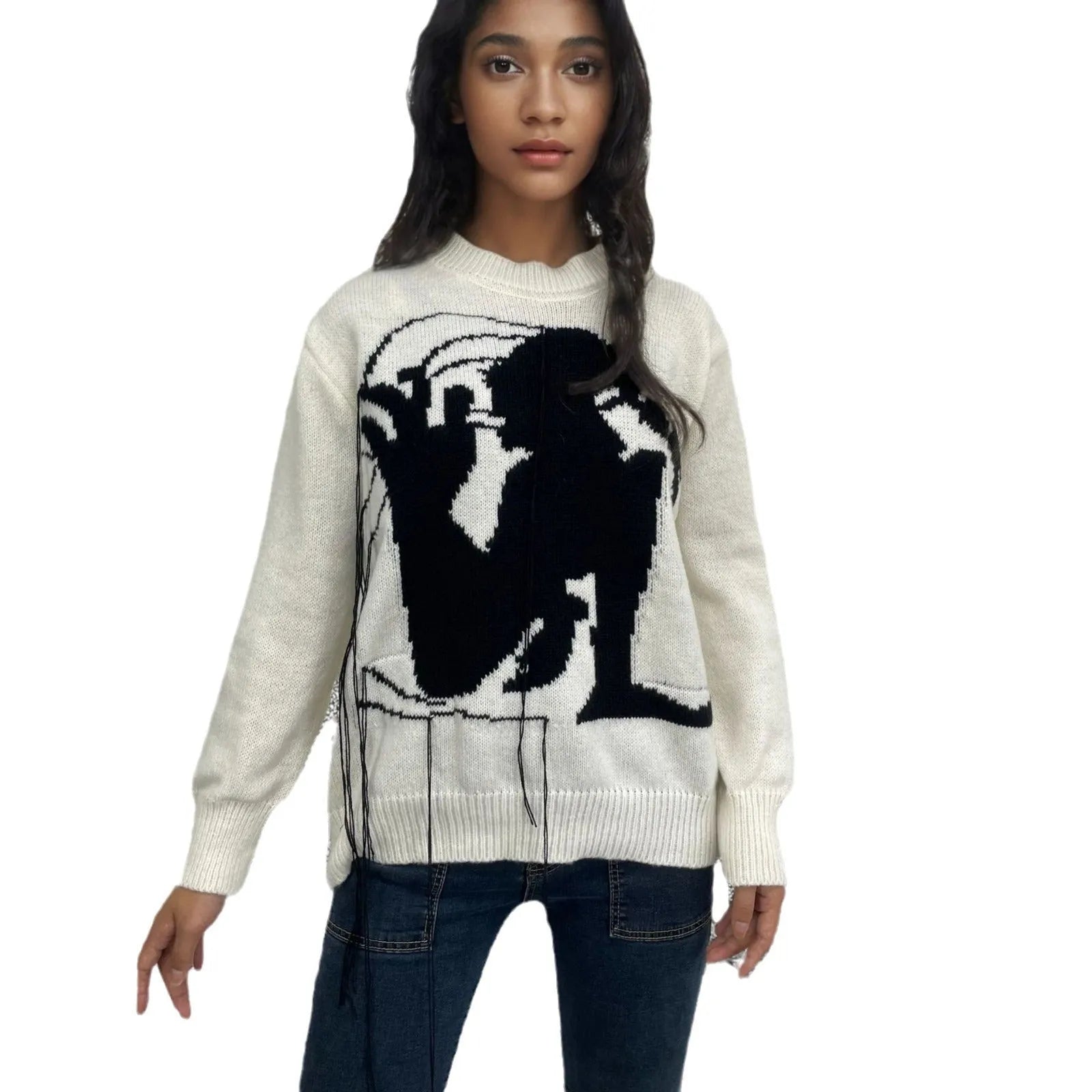 Grey women's loose alpaca wool sweater with tassel detailing and abstract pattern