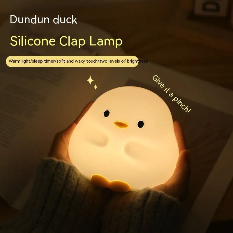 Cute duck LED night lamp in silicone with USB charging, touch sensor, and 125mm x 105mm x 110mm size
