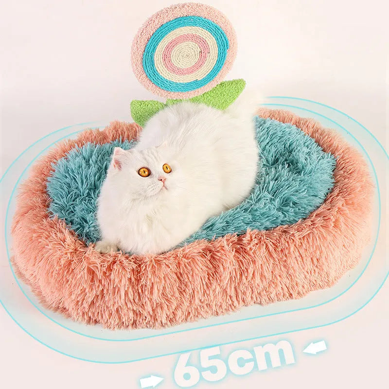 Pink elliptical cat nest bed with thick plush lining and a removable cover