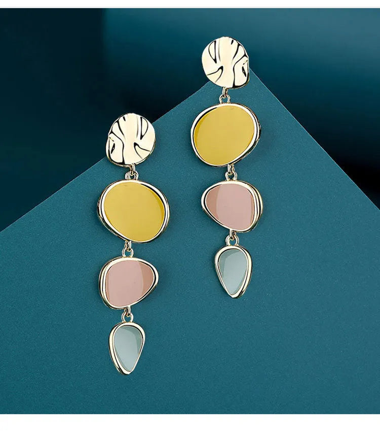 Morandi three-colour oil drip finish on disc-shaped alloy earrings with sterling silver post.