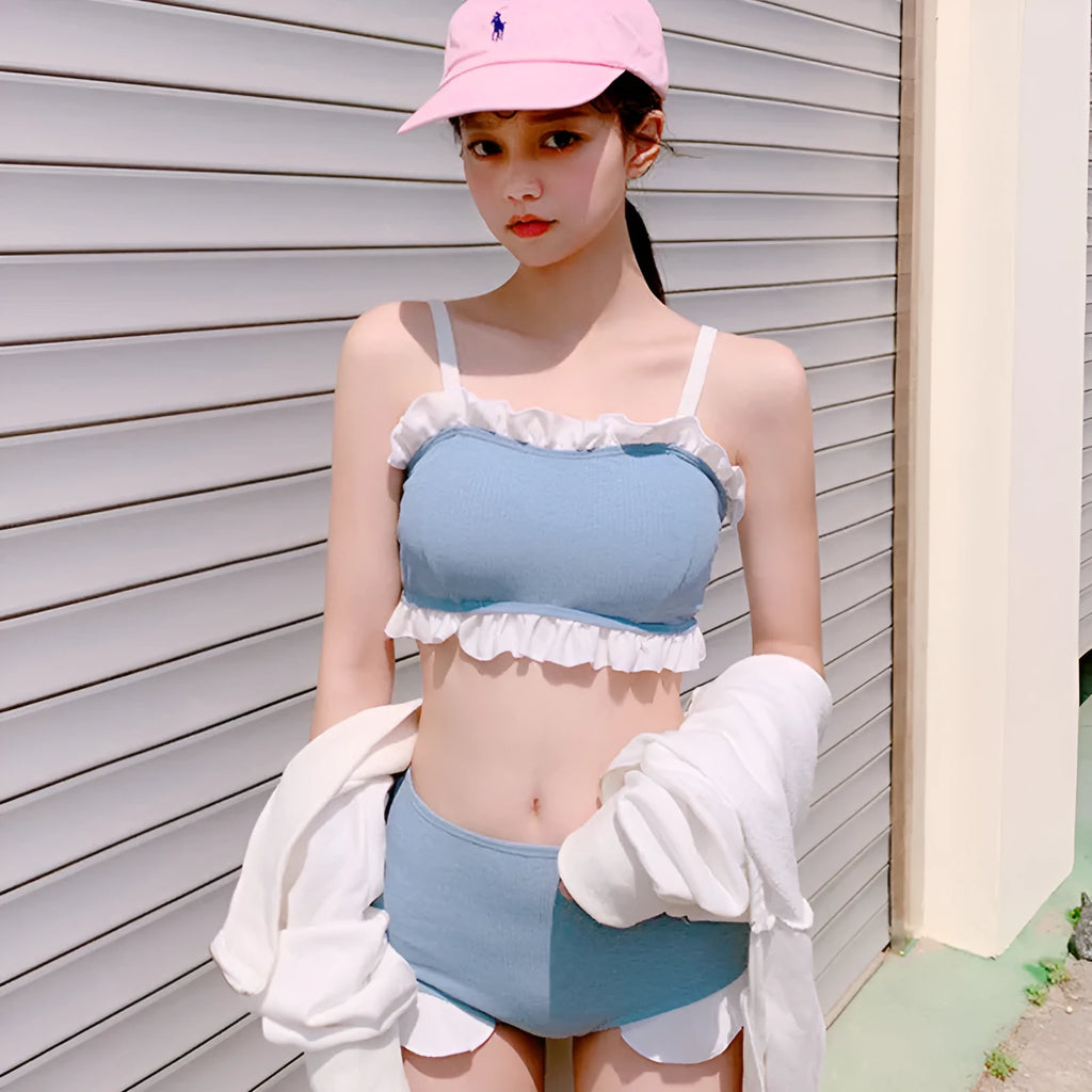 Women's conservative one-piece swimsuit with adjustable suspenders in solid colour